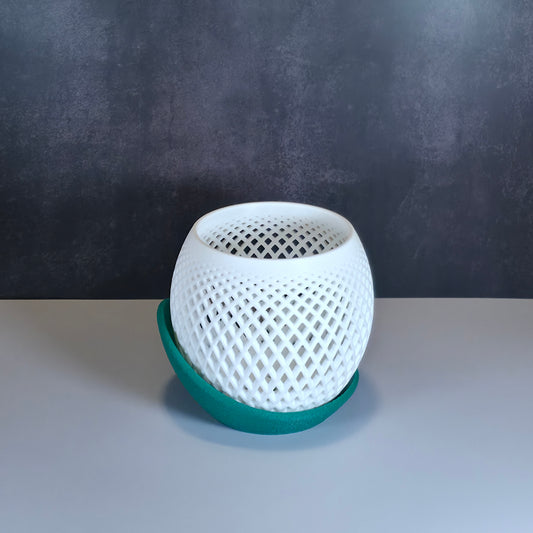 White Mesh Planter and Green Drip Tray against Dark Background