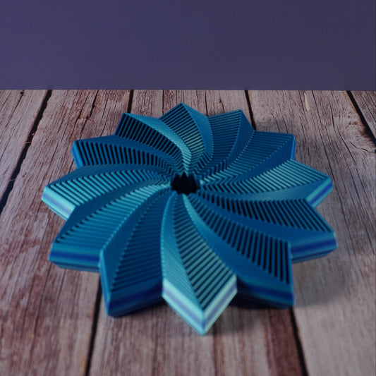 Blue decorative object on a wooden surface