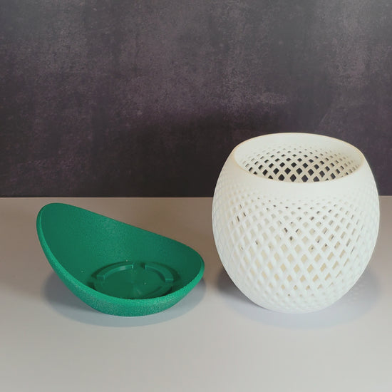 White Mesh Planter and Green Drip Tray against Dark Background