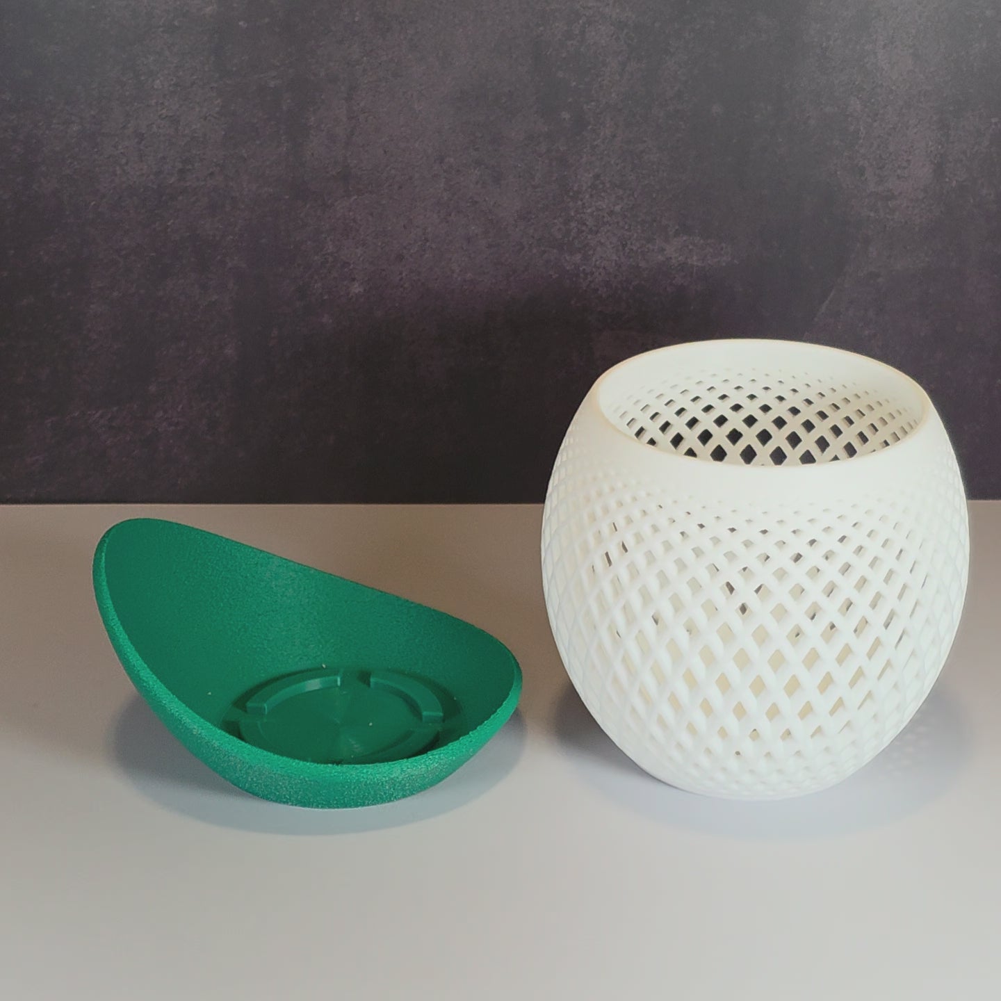 White Mesh Planter and Green Drip Tray against Dark Background